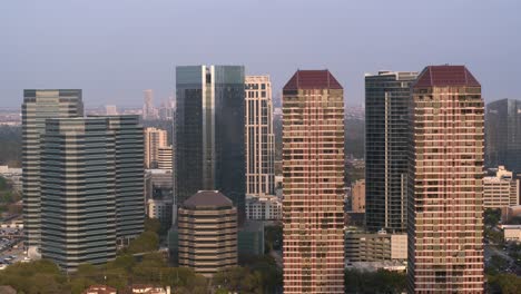 High-angle-drone-shot-of-buildings-and-surrounding-area-in-Uptown-Southwest-Houston