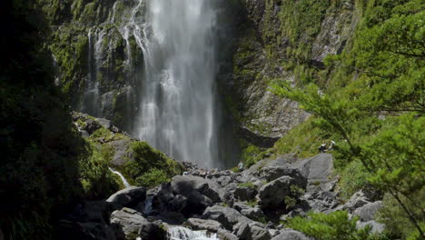 Slow-Motion-static-footage-of-the-bottom-of-the-Devil's-Punchbowl-Waterfall---Arthur's-Pass,-New-Zealand