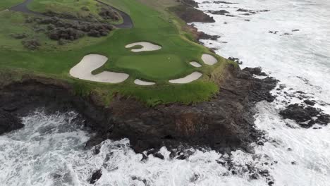 Aerial-view-of-famous-waterfront-7th-hole-at-Pebble-Beach-Golf-Course