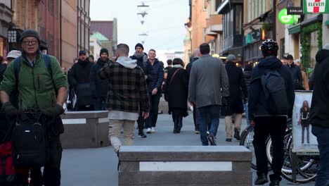 Static-slomo-of-people-on-pedestrian-street-in-Stockholm-in-autumn