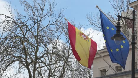 Spanish-and-European-Flags-in-Belgravia,-London,-United-Kingdom