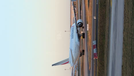 Vertical---Air-France-Airplane-On-Runway-Of-Charles-De-Gaulle-Airport-At-Sunset-In-Paris,-France