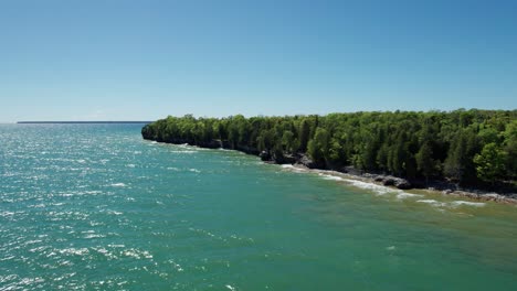 Drone-aerial-view-of-the-blue-waters-of-lake-Michigan-near-door-county