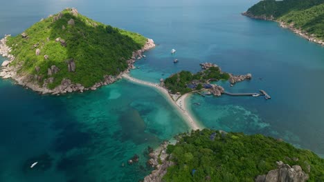Tilt-up-reveal-shot-of-Koh-Nang-Yuan-Island,-Koh-Tao-in-Thailand