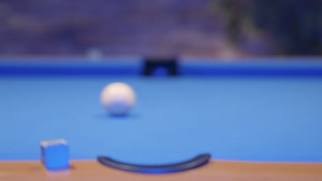 White-ball-Aiming-snooker-ball-in-the-blue-snooker-table