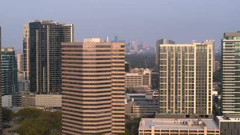 High-angle-drone-shot-of-buildings-and-surrounding-area-in-Uptown-Southwest-Houston