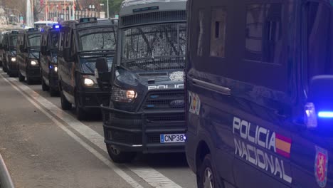 Police-vans-are-seen-leaving-the-scene-after-Spanish-farmers-and-agricultural-unions-gather-at-Plaza-de-la-Independencia-to-protest-against-unfair-competition,-agricultural-and-government-policies