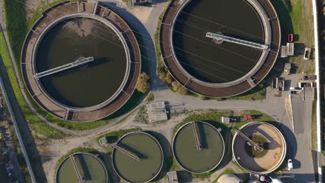 Top-down-shot-over-water-tanks-in-a-filtration-plant-in-Avignon,-France