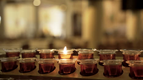 A-single-lit-prayer-candle
