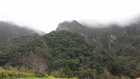 Slow-motion-shot-of-forested-foggy-Mountains-of-Madeira-island