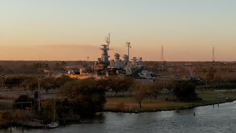 The-USS-North-Carolina-at-sunset-Wide-Aerial