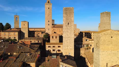 Sunset-reflected-in-the-medieval-towers-of-Tuscany-in-Italy