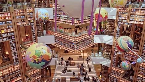 Starfield-Suwon-Library-Interior-Design-With-Massive-Bookshelf-Walls-and-3d-Extruded-Balconies-Add-an-Incredible-Dimension-to-Spacious-Hall,-People-Explore-Library