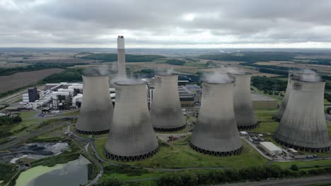 Aerial-view-over-Ratcliffe-on-Soar-power-station-smokestack-emitting-steam-on-Nottingham-countryside