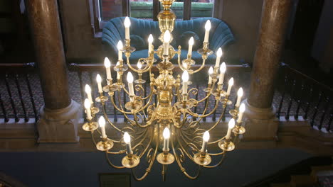 Chandelier-in-a-mansion-manor-house-stairwell-hall