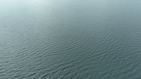 The-motion-of-water-rippling-across-serene-Lake-Toba