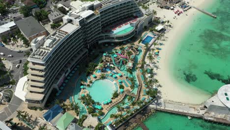 Aerial-drone-view-of-Jimmy-Buffett's-Margaritaville-Hotel-and-Resort-in-Nassau,-Bahamas