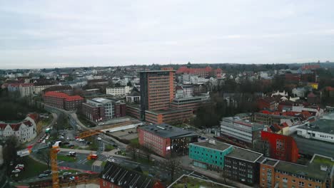 Drone-Flight-over-the-streetsof-the-historic-city-in-Flensburg,-Germany