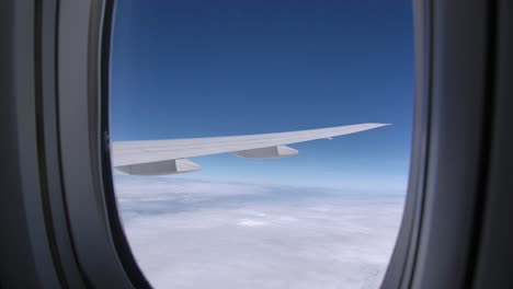 Passenger-Airplane-Wing-in-Flight-Seen-from-Cabin-Window