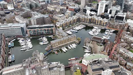Boats-moored-St-Katherines-Dock-East-London-UK-drone,aerial