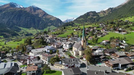 Virgen-Village-and-Church-in-Virgental-Valley,-Tyrol,-Austria---Aerial-4k-Circling