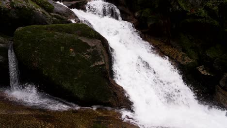 Vivid-Barrias-waterfall-over-moss-draped-rocks,-Felgueiras-Portugal