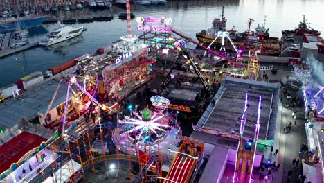 Exciting-rides-at-family-funfair-on-Genoa-waterfront,-Luna-Park