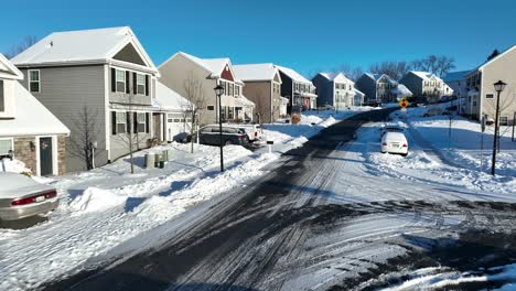 Beautiful-American-Neighborhood-on-hill-during-winter-snow