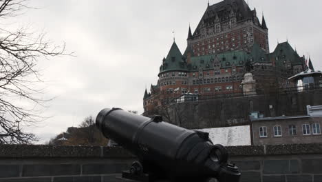 Weathered-iron-cannon-in-front-of-the-historic-Fairmont-Le-Chateau-Frontenac