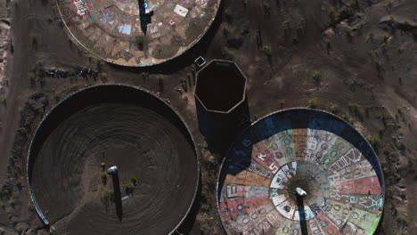 Abandoned-Three-Kids-Mine,-Circular-Thickeners-Painted-With-Graffitis,-Top-Down-Aerial-View,-Nevada-USA
