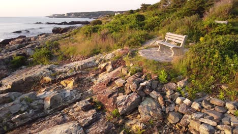 aerial-view-of-a-bench-and-luxury-resort-house-along-the-Marginal-way-trail-in-Ogunquit-Maine-USA