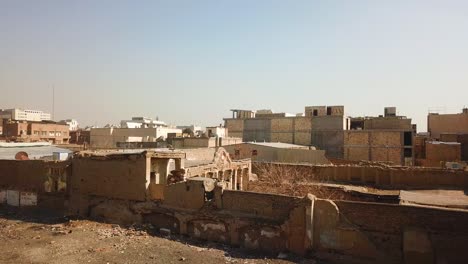 City-view-old-house-and-urban-life-the-concept-of-ruins-of-building-in-middle-east-ancient-historical-architecture-traditional-design-in-summer-afternoon-in-Iran-Tehran-capital-city