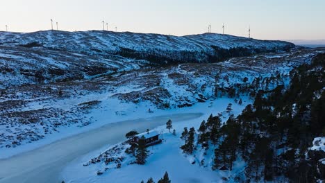 Static-Wind-Turbines-On-Mountainous-Wind-Farm-In-Winter