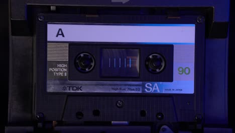 Inserting-and-Playing-Audio-Cassette-Tape-in-Deck-Player,-Close-Up