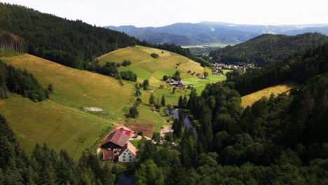 Aerial:-Capture-the-essence-of-rural-Germany-with-stunning-drone-footage-highlighting-the-timeless-charm-of-mountainous-terrain,-verdant-forests,-and-idyllic-villages-tucked-away-in-the-countryside