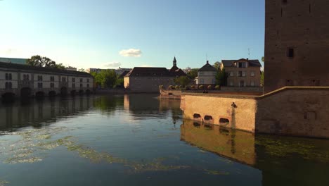 Ponts-Couverts-de-Strasbourg-Bridge-in-La-Petite-France-with-Historical-Landmark-Barrage-Vauban-on-Sunny-Evening
