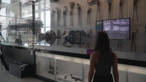 Wide-shot-of-unrecognizable-caucasian-girl-exploring-Zeppelin-Museum-in-Germany