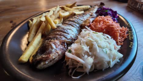 Close-Up-Trout-With-Chips-And-Mix-Salads