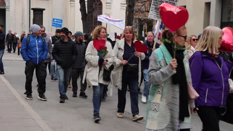 Covid-regulation-protesters-march-on-street-of-Stockholm,-Sweden