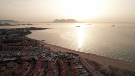 aerial-video-of-Algeciras-city-drone-in-Spain-overlooking-port-and-part-of-old-town-during-first-lights-of-sun