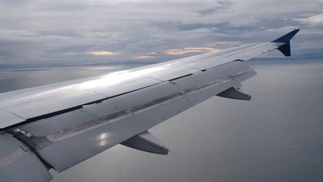 Fully-Extended-Flaps-Airplane-Wing-in-Landing-Configuration-in-Flight