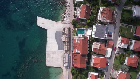 Top-Down-Aerial-View,-Beach,-Promenade-and-Beachfront-Houses-by-Adriatic-Sea,-Herceg-Novi,-Montenegro