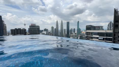 Rooftop-luxury-infinity-pool-view-of-buildings-real-estate-in-Kuala-Lumpur-Asia