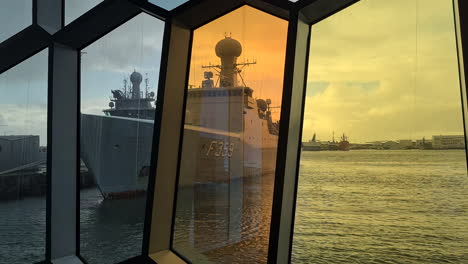 Danish-HDMS-Vædderen-F359-Navy-Patrol-Ship-in-Harbor,-View-From-Harpa-Concert-Hall-Windows,-Reykjavik,-Iceland