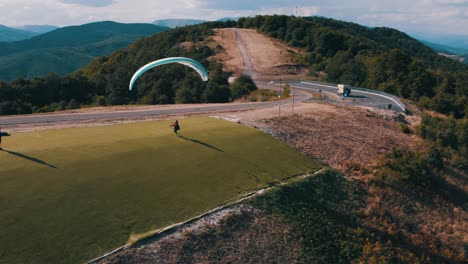 Paraglider-spreading-his-gliding-wing-but-failing-to-take-off-from-the-paragliding-start