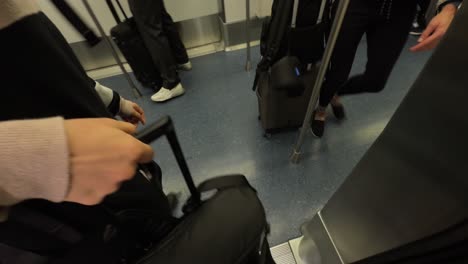 POV-Of-Boarding-Train-With-Luggage-along-with-other-travellers