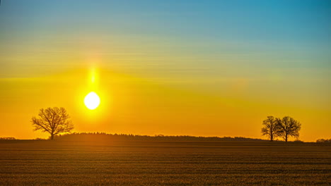 Sunrise-To-Morning-Timelapse---Sun-Rising-Over-The-Countryside-Field