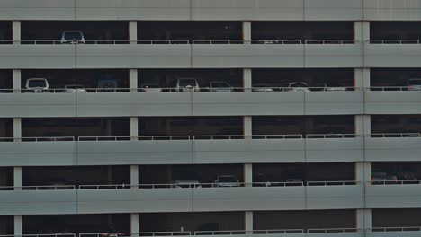 A-view-of-a-multi-story-modern-car-parking-facility-in-Dubai,-United-Arab-Emirates