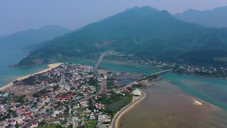 Aerial-view-flying-over-the-scenic-coastal-landscape-of-Hoi-An,-Vietnam