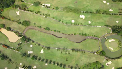 Drone-fly-over-golf-course-in-high-altitude